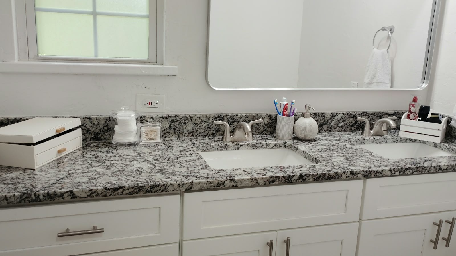 The same bathroom vanity cleared and wiped down after cleaning